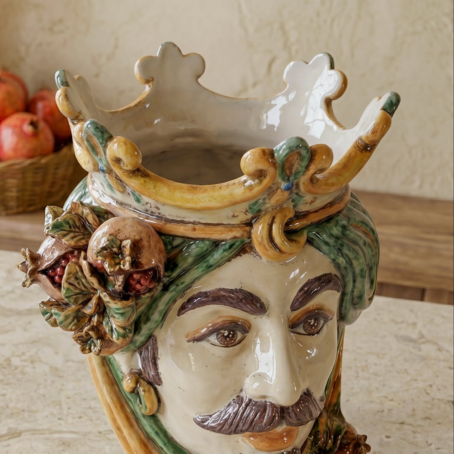 Ceramic Head with pomegranate h 25 green/orange male