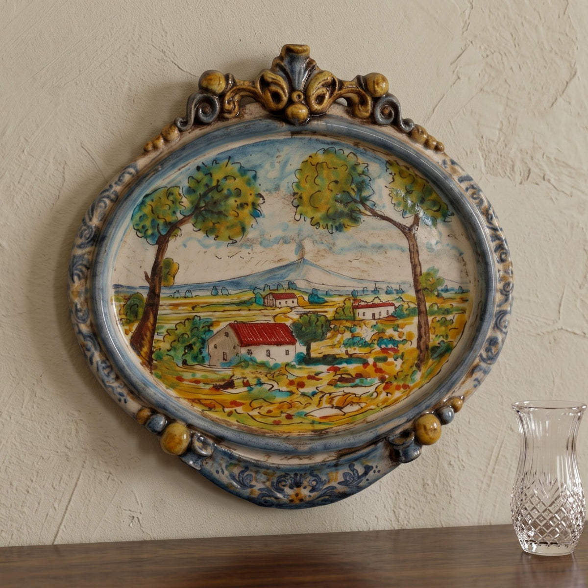Sicilian Oval Wall Plaque 23×25 cm / 9×9¾", Sicilian Landscape, Blue and Orange – Sicilian majolica handcrafted in Caltagirone