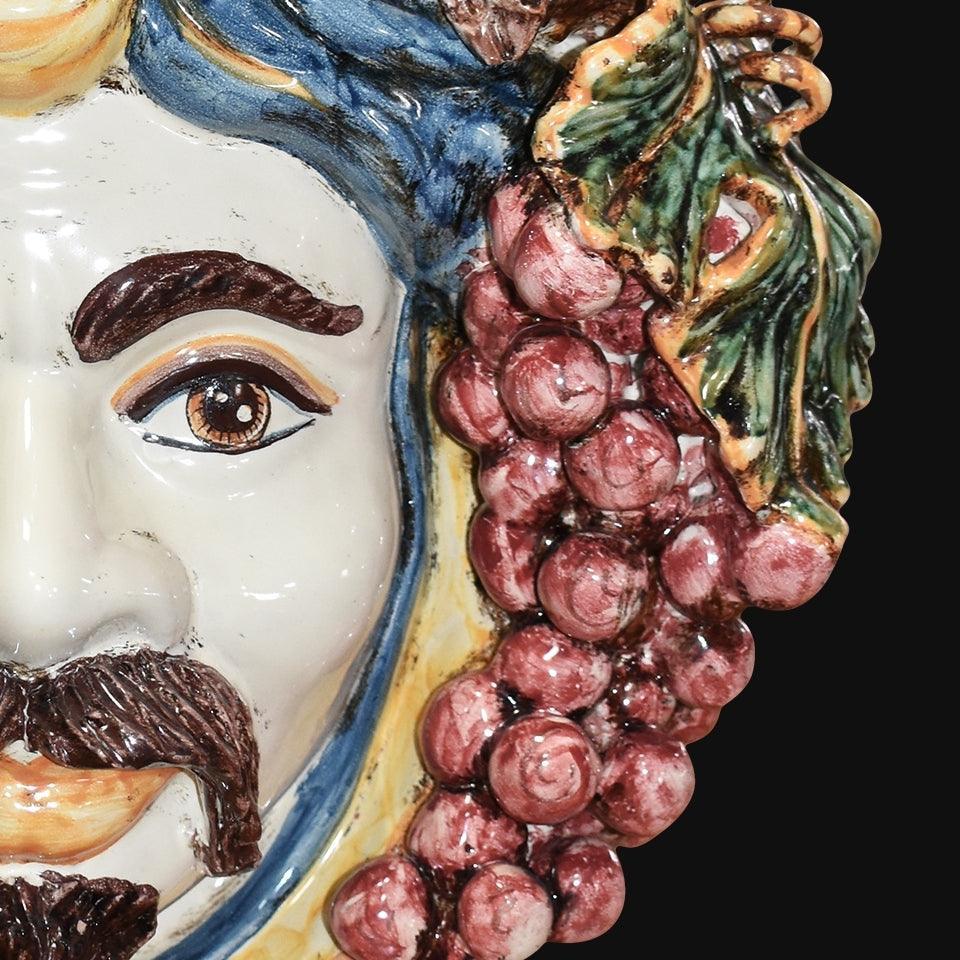 Testa di moro ceramica fatta a mano con grappolo d'uva blu e arancio, ceramiche Caltagirone