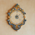 Ceramic wall clock with blue and orange decoration