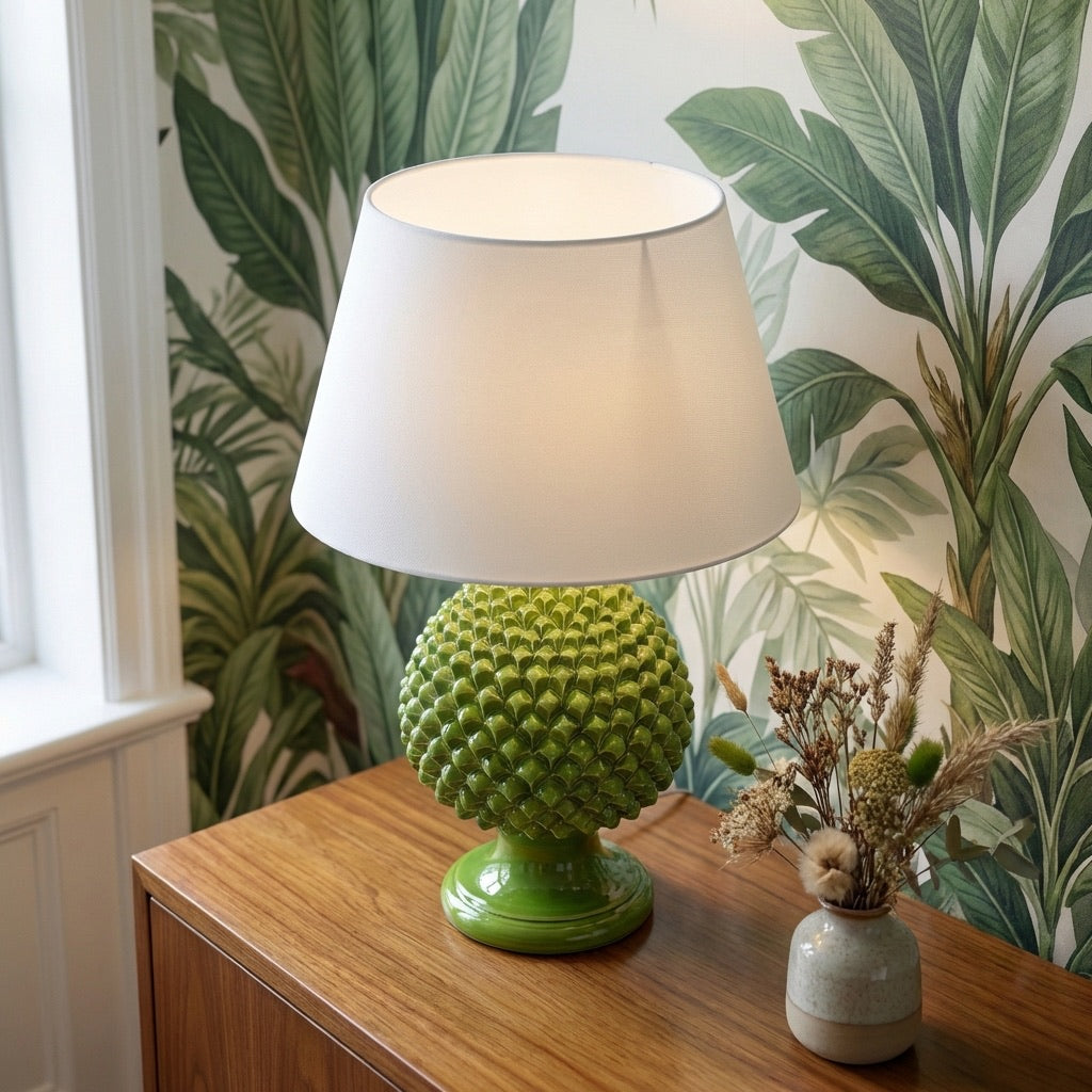 Handcrafted pine cone lamp in green leaf