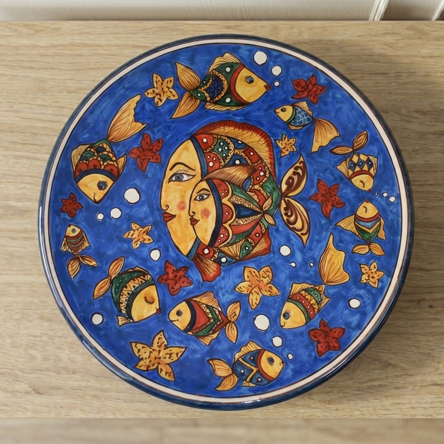 Sicilian Decorative Wall Plate, Blue Background – Caltagirone Ceramic – Sicilian artisan tradition