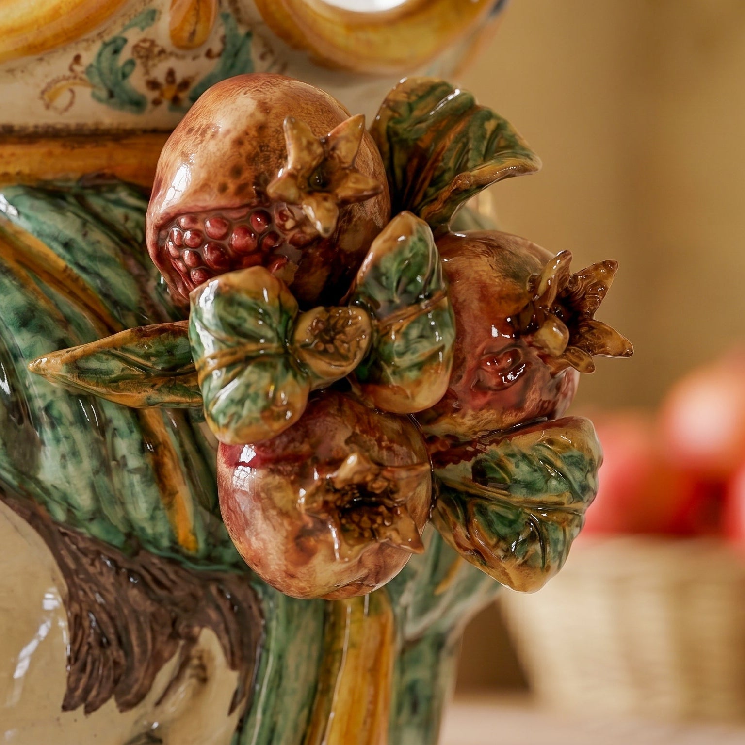 Ceramic Head with pomegranate h 25 green/orange female