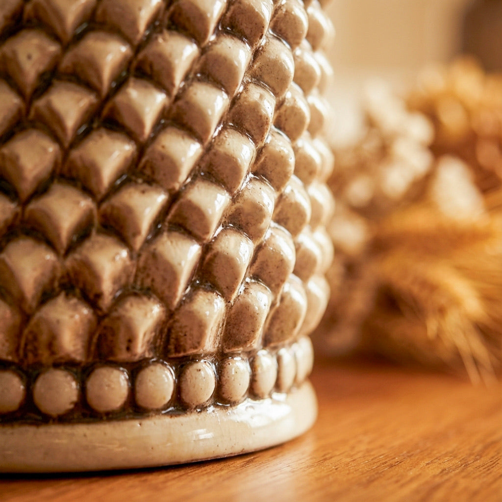 Hand-molded cylindrical pine cone vase in mother-of-pearl finish