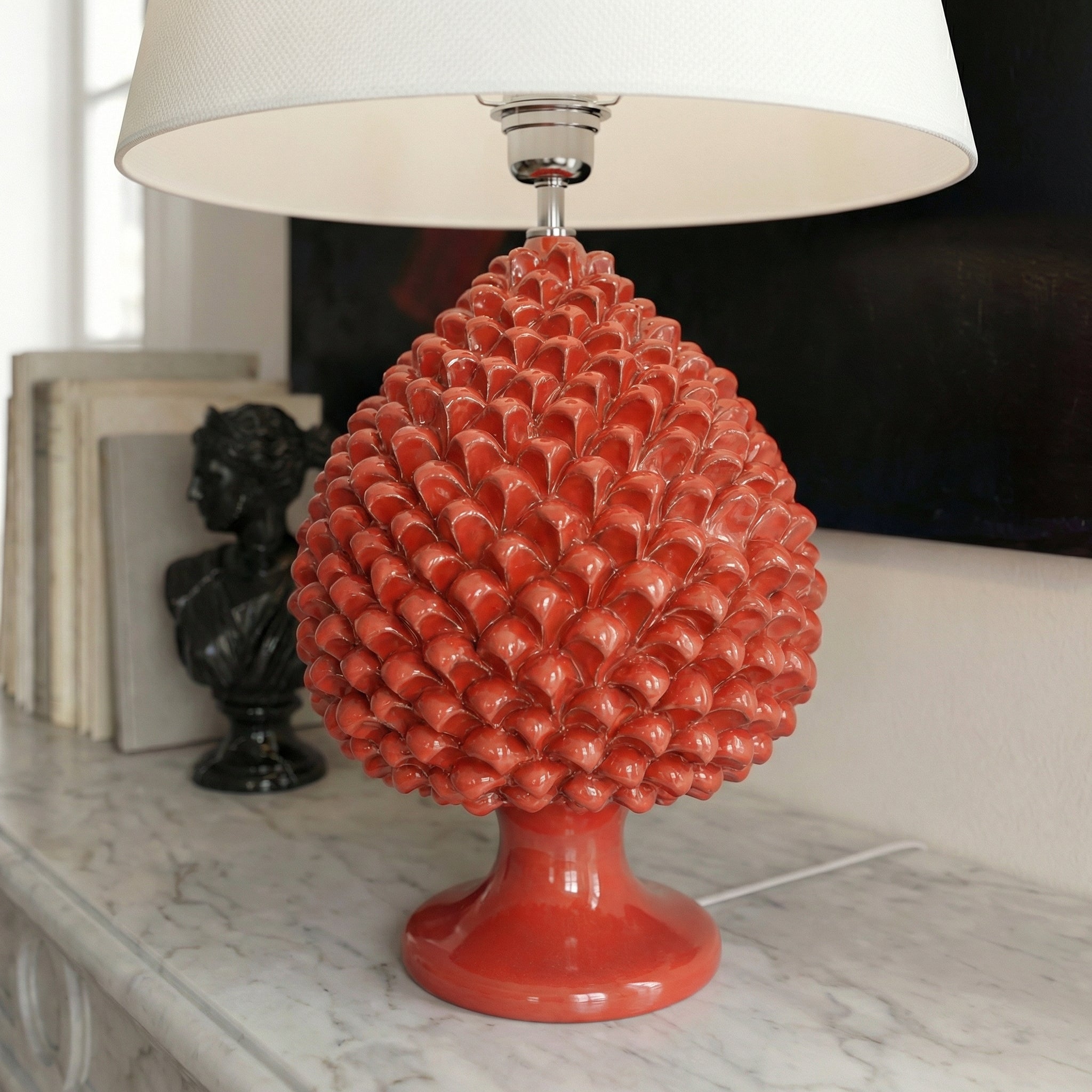 Handcrafted fiery red pine cone lamp