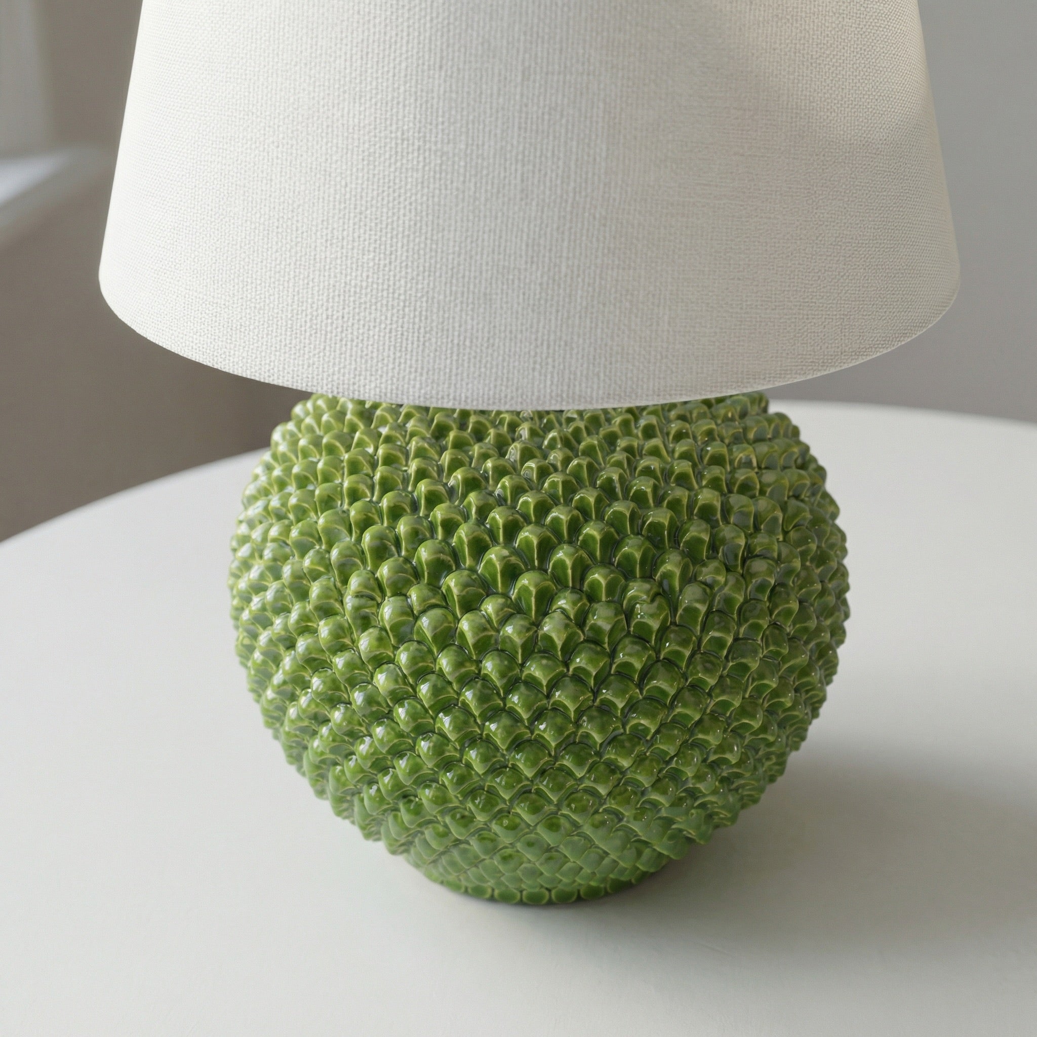 Pine cone ball lamp in various sizes, decorated in green leaf in Caltagirone ceramic.