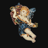 Angelo in ceramica di Caltagirone fatto a mano, con ali blu e dettagli colorati