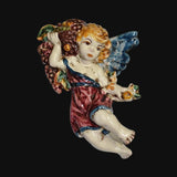 Angelo in ceramica di Caltagirone fatto a mano con uva e ali colorate, pezzo artigianale unico