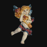 Angelo in ceramica di Caltagirone fatto a mano con ali blu e fiori, pezzo artigianale unico