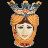 Ceramiche di Caltagirone fatti a mano: testa femminile con corona colorata e dettagli artigianali